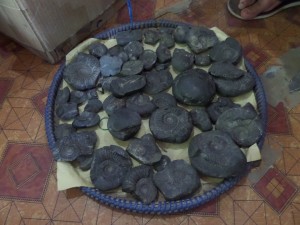 A basket of stones for sale.