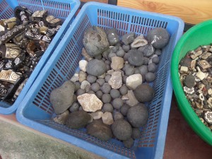 Raw Shaligram stones often appeared on shop shelves mixed with other minerals and semi-precious stones.